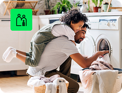 user multitasking with household chores and filing taxes online through H&R Block free tax preparation