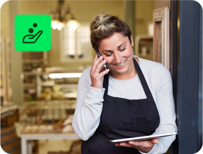 small business owner reviewing tax return using H&R Block Free Online tax filing on a tablet