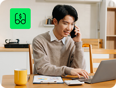 person using H&R Block Deluxe Online Tax Filing with unlimited expert tax help feature on laptop