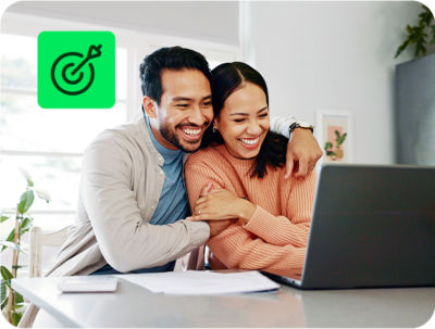 couple completing tax return together using H&R Block Free Online tax filing on a laptop