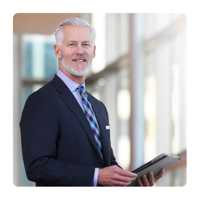 professional male in suit smiling at camera