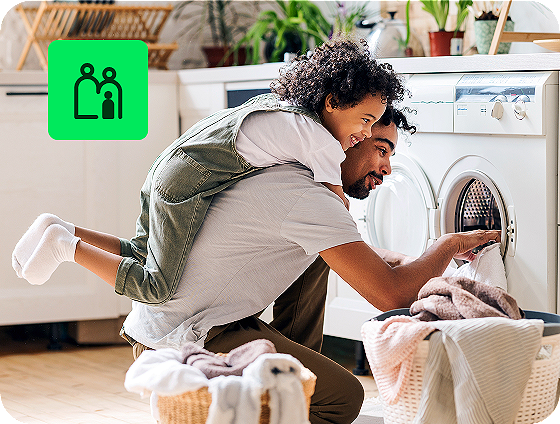 user multitasking with household chores and filing taxes online through H&R Block free tax preparation