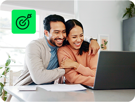 couple completing tax return together using H&R Block Free Online tax filing on a laptop