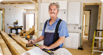 male small business owner using H&R Block’s payroll services