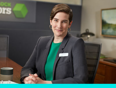 A trusted Block Advisors tax expert at a desk