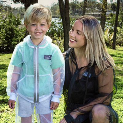 woman standing with young boy wearing insect repellant jackets