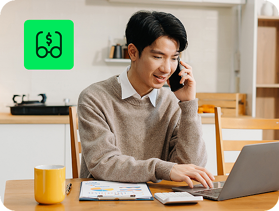 person using H&R Block Deluxe Online Tax Filing with unlimited expert tax help feature on laptop