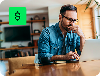user reviewing income reporting details with H&R Block Self-Employed Online Tax Filing on a laptop